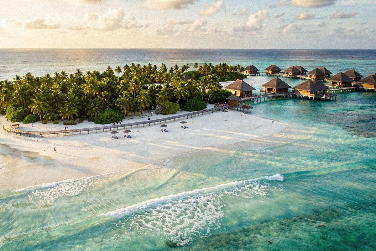 Aerial view of beach and villas in South Ari Atoll, Maldives